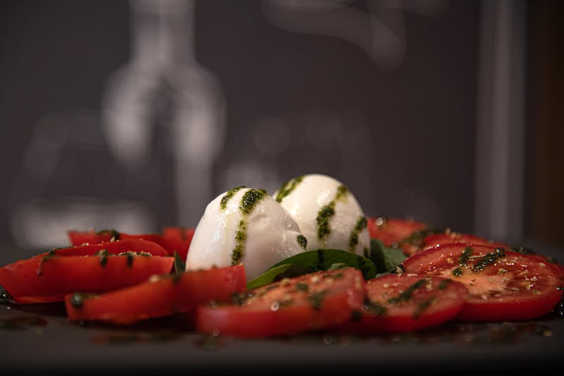 Caprese Mozzarella - fresh mozzarella with tomatoes and basil